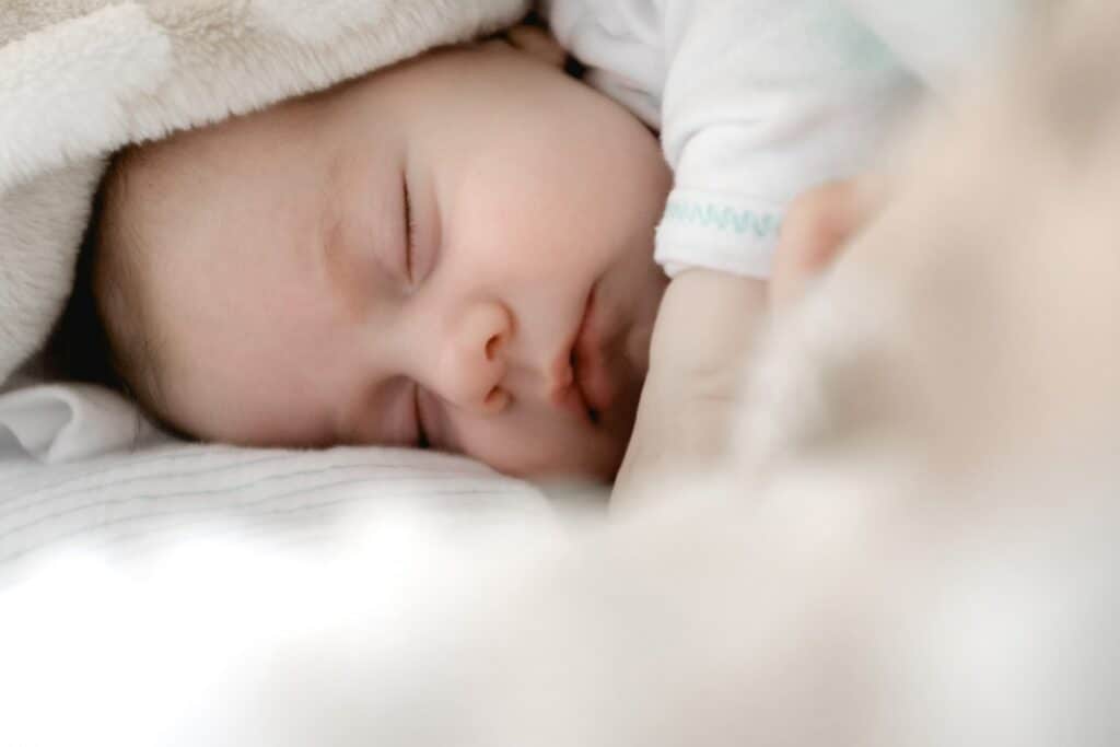 Výsledky IVF cyklů za rok 2021 6 - Sanatorium Helios CZ selective focus photography of sleeping baby